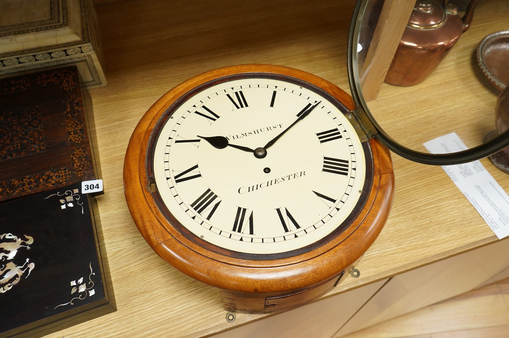 A circular dial mahogany cased wall clock with a single train fusee movement, painted dial reading Wilmshurst, Chichester, 39cm in diameter